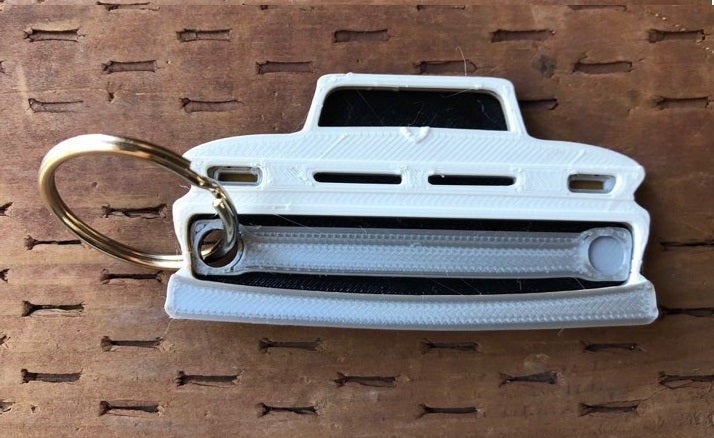 3D Printed 1960–1966 Truck Keychain Front View Ready To Paint
