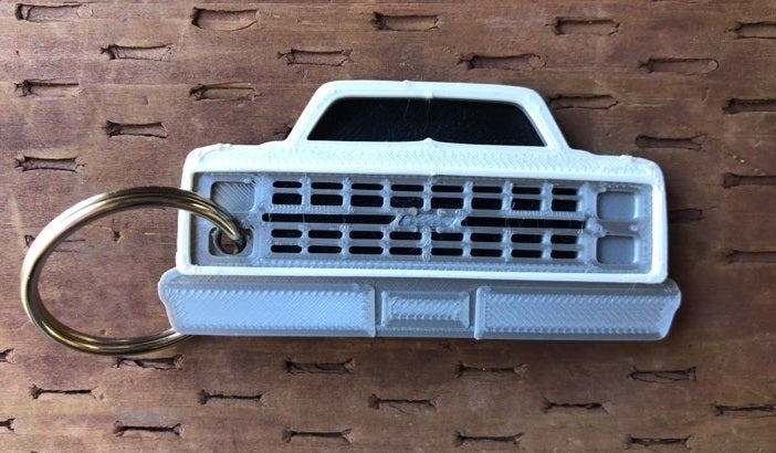 3D Printed 1981–1987 Truck Keychain Front View Ready To Paint