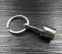Load image into Gallery viewer, Metal Piston Truck/Car Keychain
